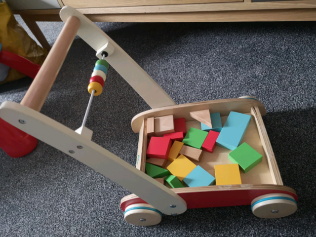 childs wooden trolley with bricks